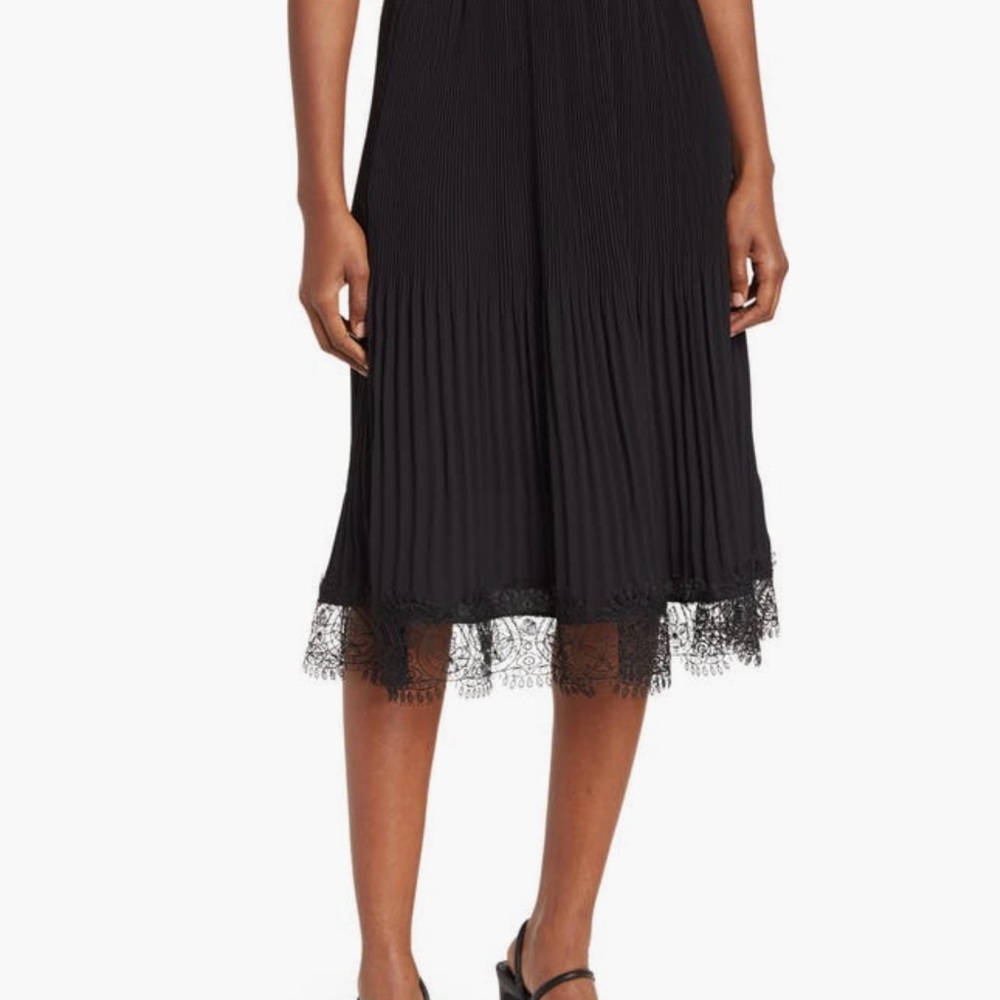 Elegant Black Pleated Skirt with Lace Hem